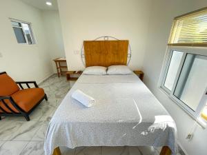Voodi või voodid majutusasutuse Buenosdías Izamal toas