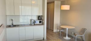 Kuchyň nebo kuchyňský kout v ubytování Apartamenty Czarna Góra Is28