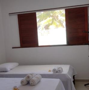 Katil atau katil-katil dalam bilik di Casa Praia Pontal do Coruripe +28 gambar
