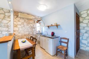 Kuhinja ili čajna kuhinja u objektu Abeloklima country house +4 fotografije