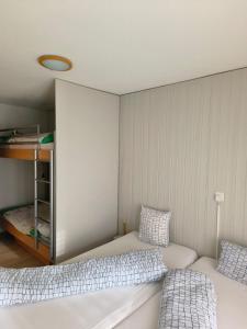 Postel nebo postele na pokoji v ubytování Ferienwohnung Nr.22,Haus Azurit