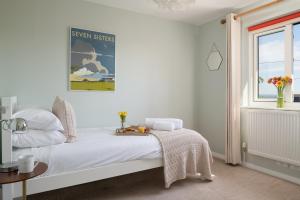 Ένα ή περισσότερα κρεβάτια σε δωμάτιο στο Lewes Heights is a spacious modern luxury home with stunning views