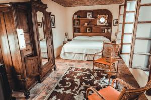 Postel nebo postele na pokoji v ubytování Hacienda Sepulveda Hotel & Spa
