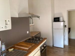 Kuchyňa alebo kuchynka v ubytovaní Toulouse centre: T2 bis dans immeuble historique + 6 fotografií