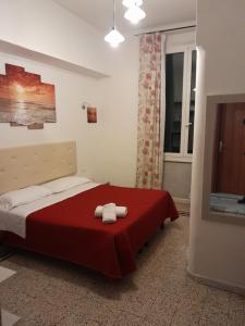 Postel nebo postele na pokoji v ubytování Nautilus Hotel
