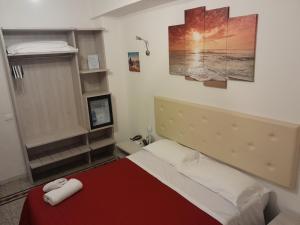 Postel nebo postele na pokoji v ubytování Nautilus Hotel
