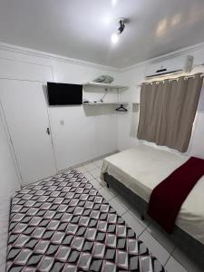 En eller flere senge i et værelse på Hospedagem em Porto de Galinhas - Pertinho do Mar + 17 billeder