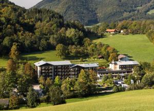 an aerial view of a hotel in the mountains at Gesundheits- & Wellnessresort Salzerbad in Kleinzell