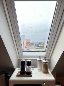 a skylight in a kitchen with a window at Entire Loft Space in quiet village near Roman City of Lincoln in Lincoln