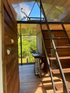 a view from the loft of a tiny house at Queen house in Nosara