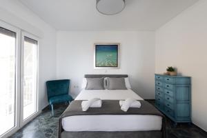 Posteľ alebo postele v izbe v ubytovaní Seaside Bliss Flat