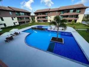 an image of a swimming pool at a resort at Apto Térreo Luxo na Praia dos Carneiros - Beira Mar in Praia dos Carneiros