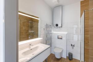 Kúpeľňa v ubytovaní La Bella Centrum apartmanok Piros/Sárga