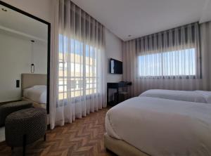 Postel nebo postele na pokoji v ubytování Penthouse haut standing avec vue panoramique