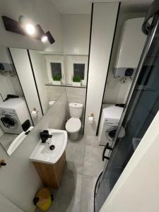 Kúpeľňa v ubytovaní Apartament Nadbrzezna