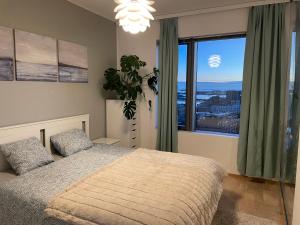 Postel nebo postele na pokoji v ubytování Fabulous Morden Apartment in Helsinki