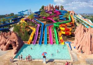 a water park with a pool and a water slide at Sunshine Apartment Alvor in Alvor