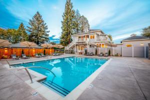 a house with a swimming pool in front of a house at The Ruse in Healdsburg