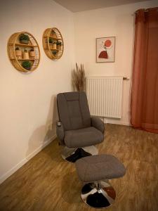 Posedenie v ubytovaní Nature&Spa Appartement avec Jacuzzi & Sauna privé
