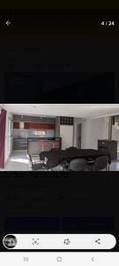 a view of a room with chairs and a kitchen at Hermosa casa en Lomas Del Rey in San Antonio de Arredondo +29 photos