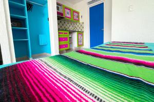 Postel nebo postele na pokoji v ubytování Renovated Studio in Cancun Beach at the Hotel Zone