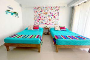 Postel nebo postele na pokoji v ubytování Renovated Studio in Cancun Beach at the Hotel Zone