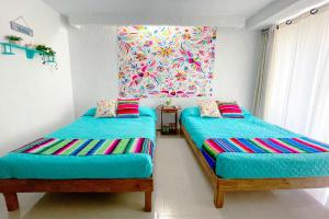 Postel nebo postele na pokoji v ubytování Renovated Studio in Cancun Beach at the Hotel Zone