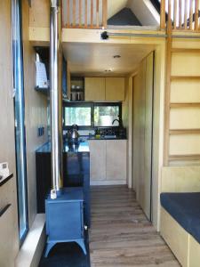 Η κουζίνα ή μικρή κουζίνα στο Viví la experiencia de hospedarte en una tiny +20 φωτογραφίες