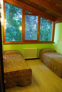 Posteľ alebo postele v izbe v ubytovaní Agriturismo Il Frutto Permesso