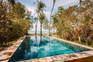 Der Swimmingpool an oder in der Nähe von Ocean Bay Resort & Spa Phu Quoc