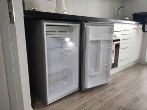 Kuchyň nebo kuchyňský kout v ubytování Departamento estudio511 IslaTeja + 12 fotografií