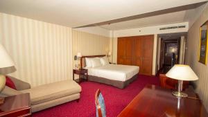 Voodi või voodid majutusasutuse Redtop Hotel & Convention Center toas