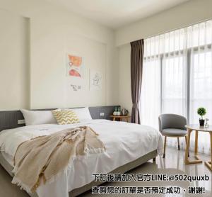 Postel nebo postele na pokoji v ubytování Mini House B&B
