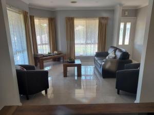 Numurkah Self Contained Apartments - The Mieklejohn的休息区