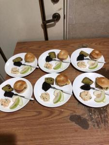 a group of plates of food on a table at Lohas Seaview B&B in Beigan