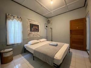 Voodi või voodid majutusasutuse Reeneo Guesthouse toas