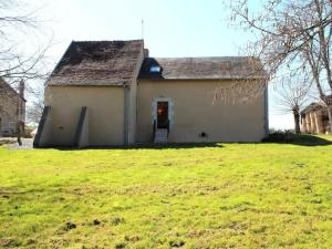 a white house with a grass field in front of it at Gîte Saint-Sauvier, 3 pièces, 6 personnes - FR-1-489-404 