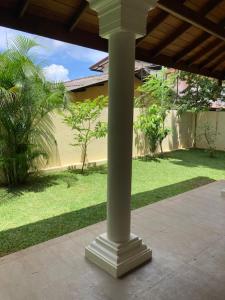 a white pole in the middle of a yard at GREEN Palace in Maharagama