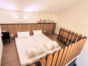 Katil atau katil-katil dalam bilik di Yuzhou Garden B&B