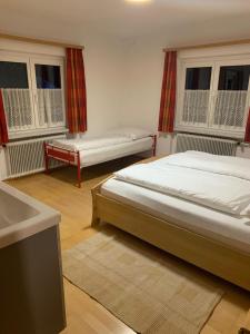 Postel nebo postele na pokoji v ubytování Haus Angelika