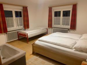 Postel nebo postele na pokoji v ubytování Haus Angelika