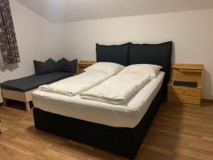 Postel nebo postele na pokoji v ubytování Haus Angelika