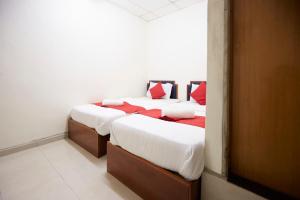 Jerteh Hotel, Terengganu客房内的一张或多张床位