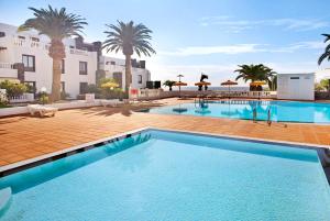 Bazén v ubytovaní Perla del Playa Grande alebo v jeho blízkosti