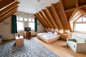 Postel nebo postele na pokoji v ubytování Hotel am Stadthaus
