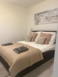 Postel nebo postele na pokoji v ubytování Apartamenty u Ewy - EUROS