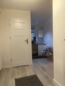 Kuchyň nebo kuchyňský kout v ubytování Apartamenty u Ewy - EUROS