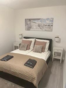 Postel nebo postele na pokoji v ubytování Apartamenty u Ewy - EUROS