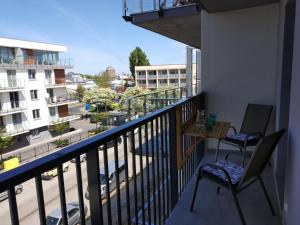 Balkon lub taras w obiekcie Apartament Kapitalny przy porcie w Kołobrzegu z rowerownią i placem zabaw