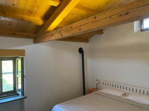Postel nebo postele na pokoji v ubytování Villa Šterna II - Ferienhaus mit Pool und Garten